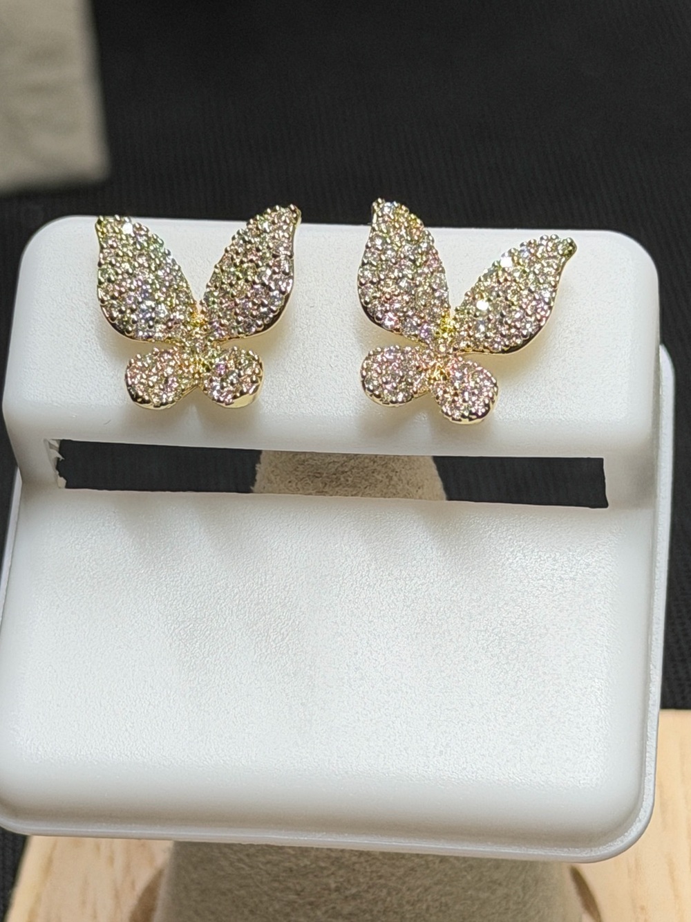 .22 moissanite, 18k triple plated gold butterfly design earring.  Retail $ 320